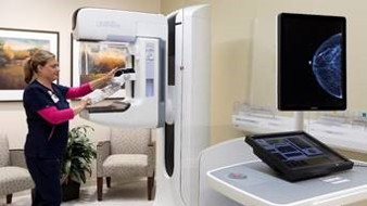 women's health services - mammography machine with nurse
